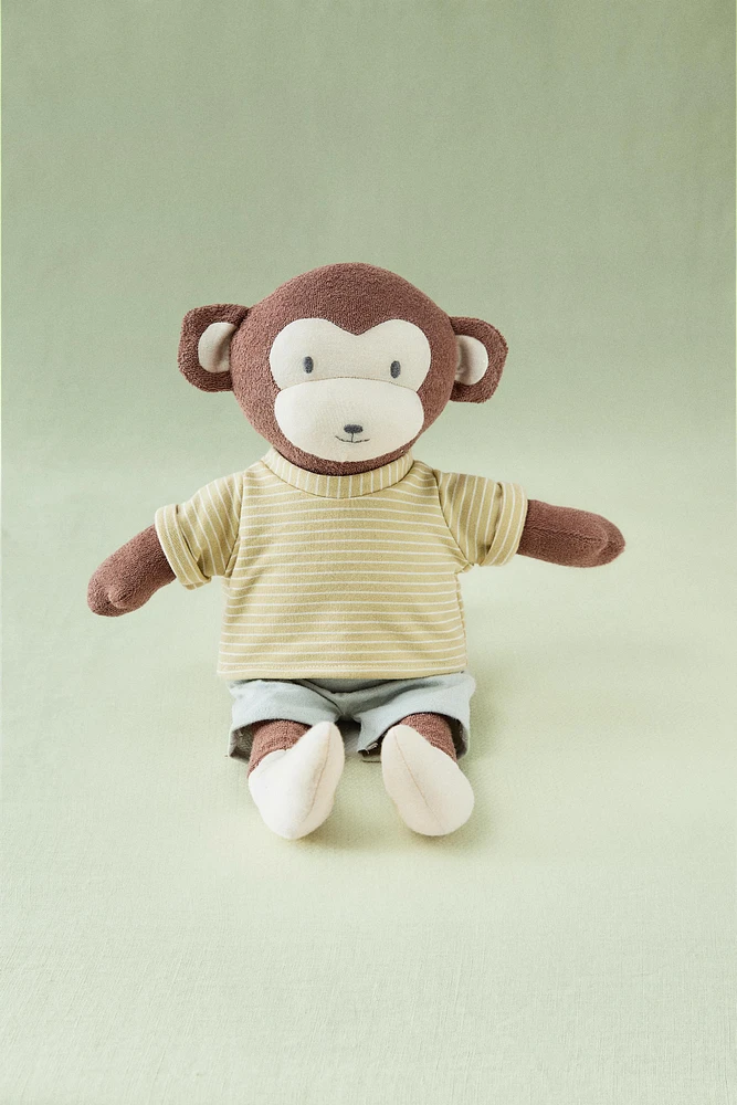 PELUCHE ENFANT SINGE MUSICAL