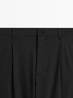 Relaxed fit trousers with darts