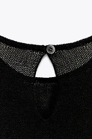 TOP EN MAILLE POINTELLE LATÉRAL