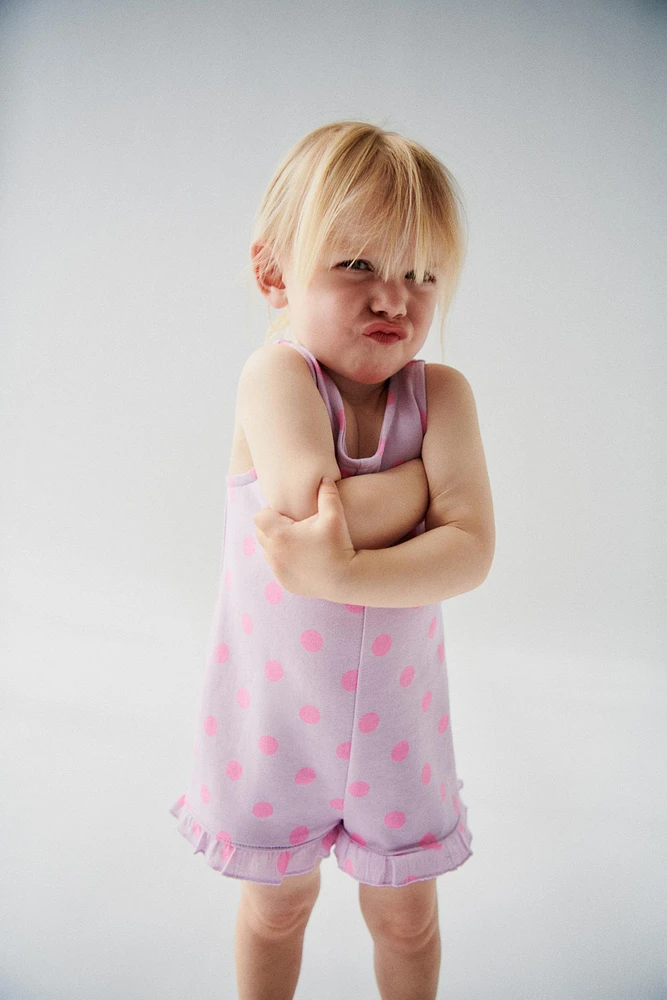 RUFFLED PRINT JUMPSUIT