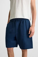 BERMUDA DE JOGGING COUTURES