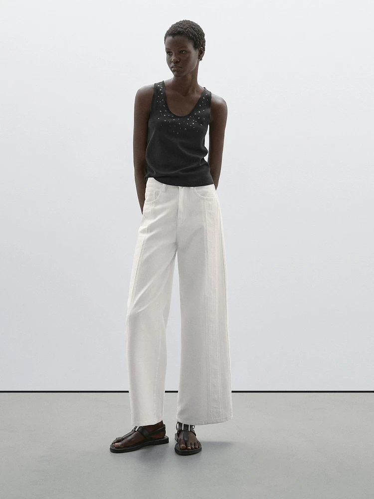 Jean wide leg taille haute avec découpes