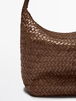 Sac seau tressé en cuir nappa