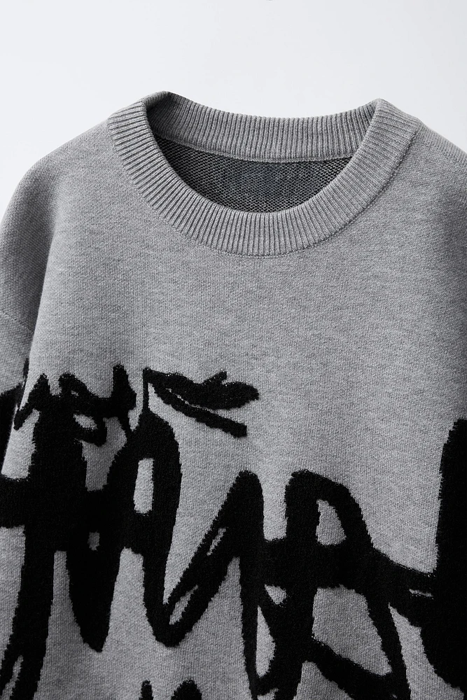 PULL EN MAILLE GRAFFITI