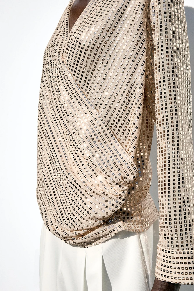 SEQUIN WRAP BLOUSE
