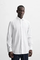 CHEMISE REGULAR FIT POIGNETS BOUTON DE MANCHETTE