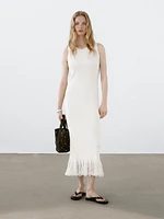 Knit dress with fringed hem