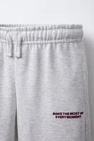 PLUSH RAISED TEXT JOGGER PANTS