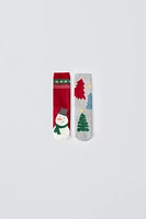 TWO-PACK OF NON-SLIP CHRISTMAS TREE AND SNOWMAN SOCKS