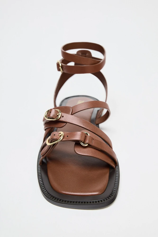 FLAT LEATHER STRAP SANDALS