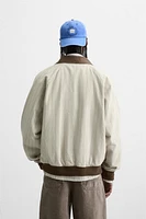 BLOUSON À RAYURES CONTRASTÉES