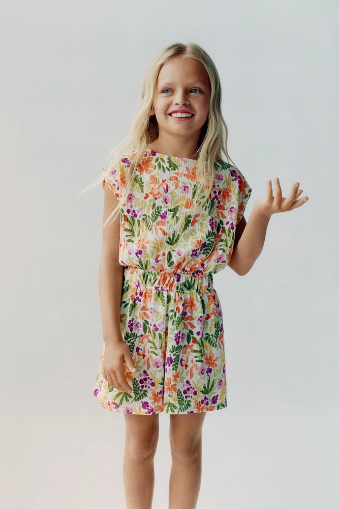 TEXTURED FLORAL SHORT JUMPSUIT