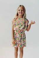 TEXTURED FLORAL SHORT JUMPSUIT