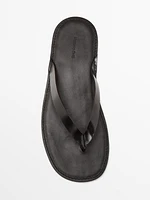 Sandales entre-doigts en cuir