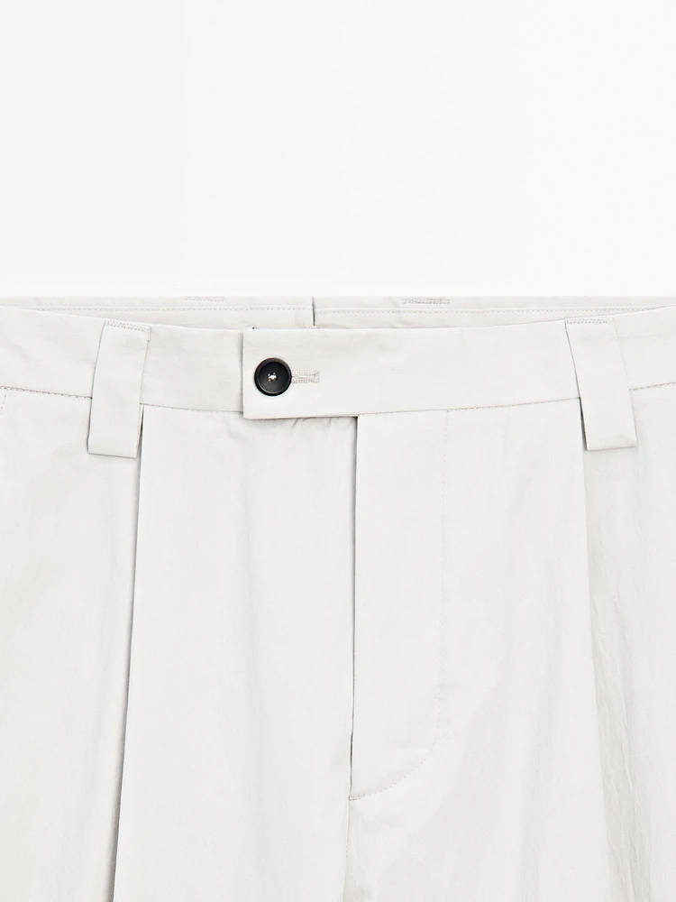 Pantalon à pince en crêpe de coton mélangé - Limited Edition
