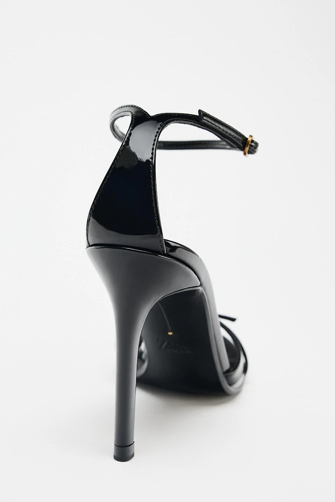 HIGH HEELED BUCKLE SANDALS