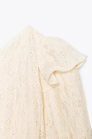 TOP ASYMÉTRIQUE BRODÉ