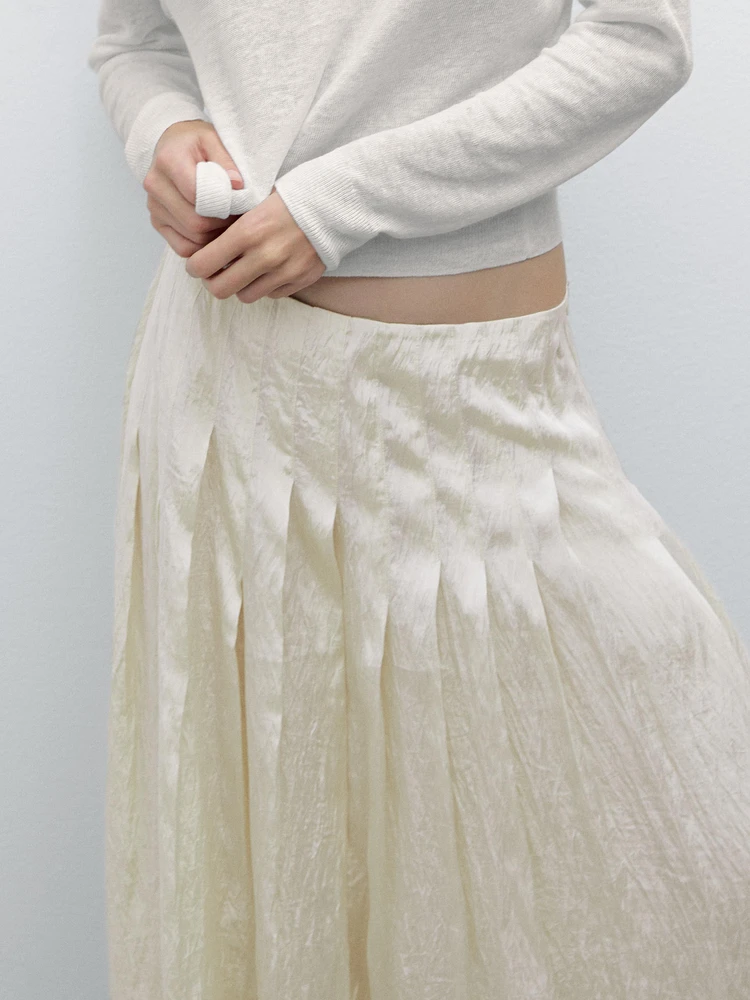 Flowing midi skirt with box pleats