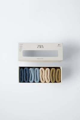FOUR-PACK OF COLORFUL SOCKS
