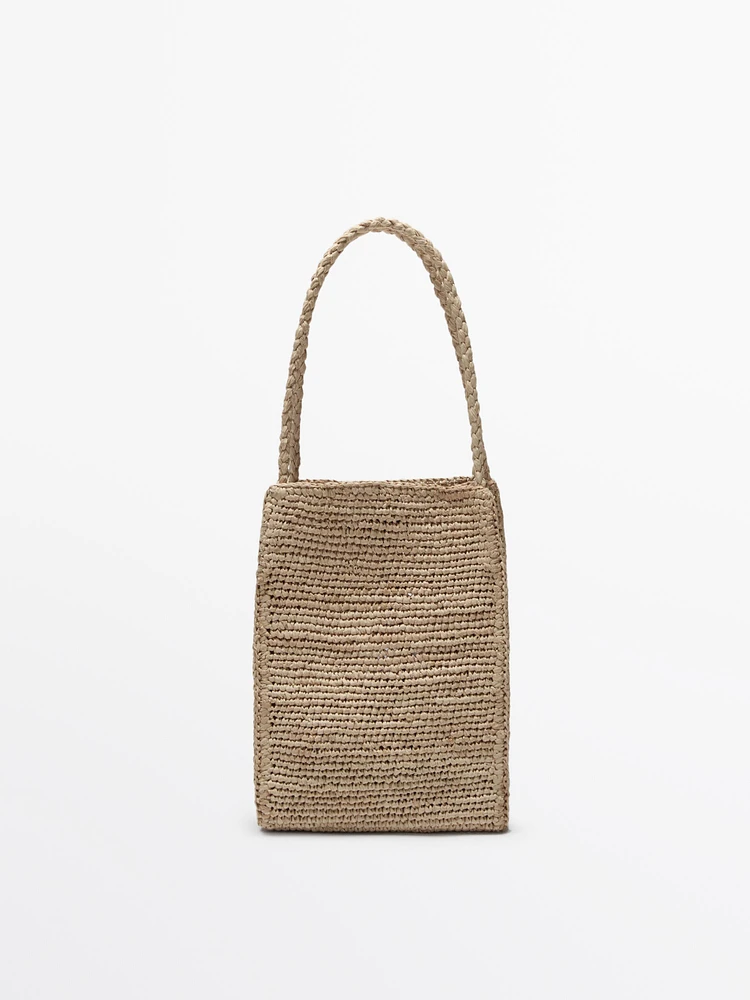 Natural raffia bucket bag