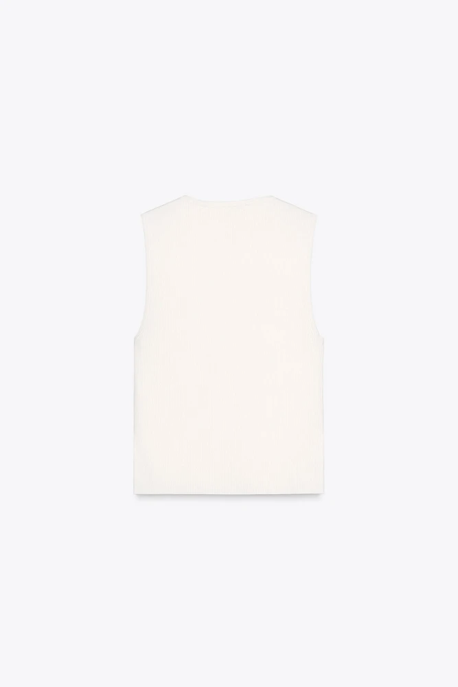 TOP GILET EN MAILLE CÔTELÉE