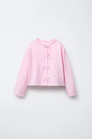 GILET EN MAILLE NŒUDS