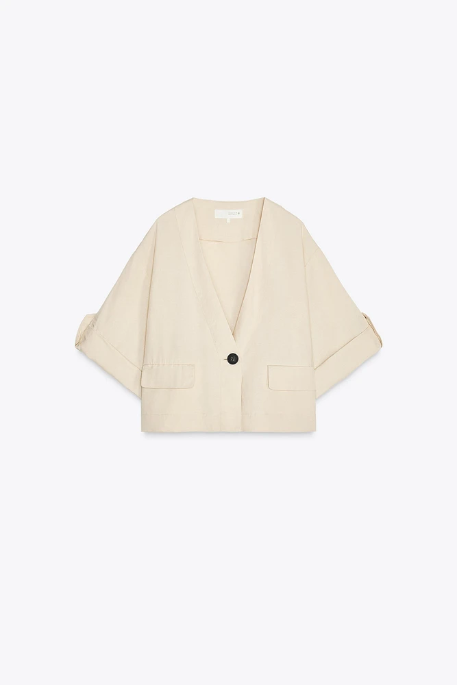 VESTE À MANCHES RETROUSSÉES