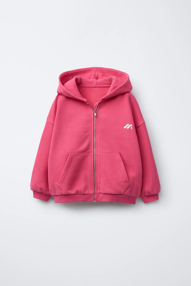 SWEAT À CAPUCHE ET LOGO