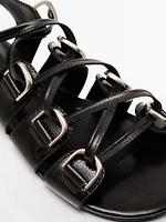 Lace-up sandals with rings