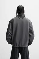 BLOUSON CONTRASTANT DÉPERLANT