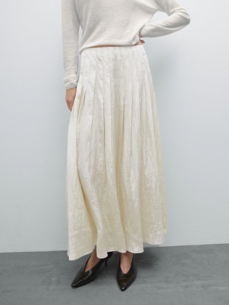 Flowing midi skirt with box pleats