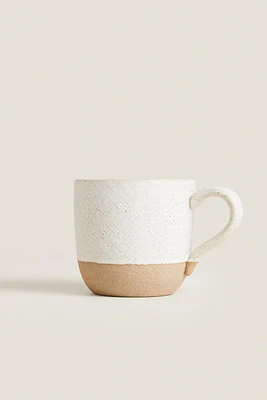 MUG WITH RAISED DESIGN