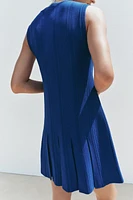 ROBE EN MAILLE À PLIS PLATS