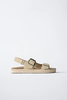 LEATHER SANDALS WITH JUTE BUCKLES