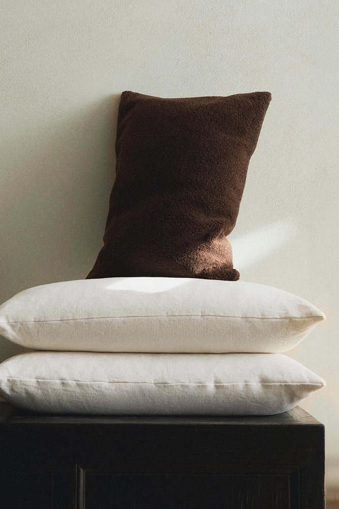 HOUSSE DE COUSSIN EFFET PEAU D’AGNEAU