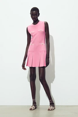 PLEATED KNIT DRESS