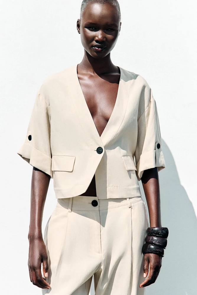 VESTE À MANCHES RETROUSSÉES