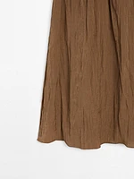 Lightweight pleated skirt with elasticated waistband