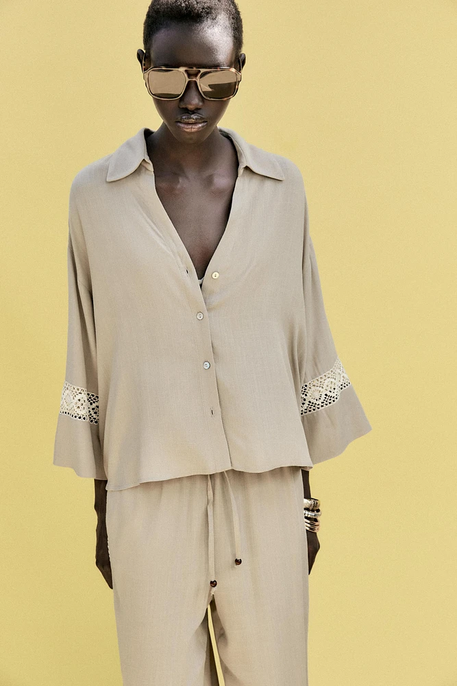 EMBROIDERED SLEEVE SHIRT