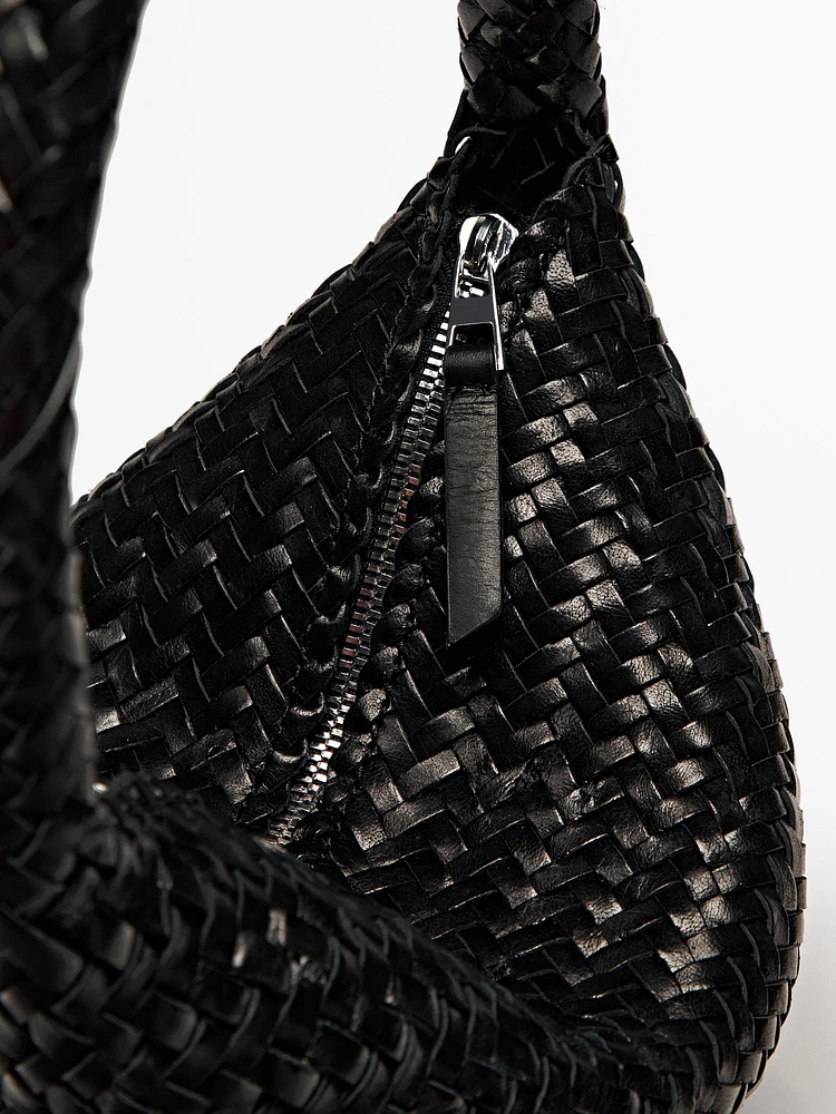 Sac seau tressé en cuir nappa