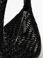 Sac seau tressé en cuir nappa