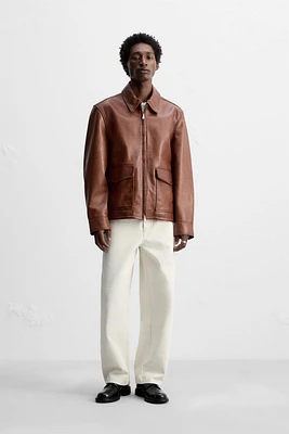 BLOUSON EN CUIR DÉLAVÉ