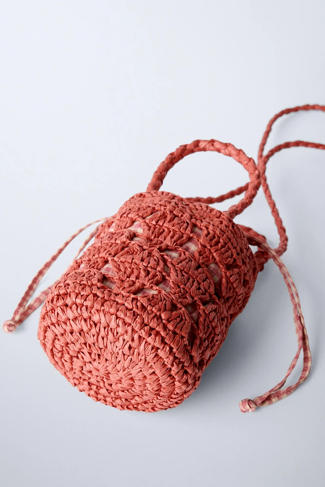 HEARTS RAFFIA BUCKET BAG