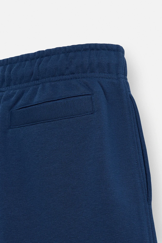 BERMUDA DE JOGGING COUTURES