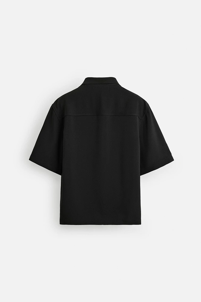 FLOWY POLO SHIRT