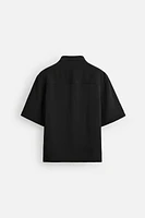 FLOWY POLO SHIRT