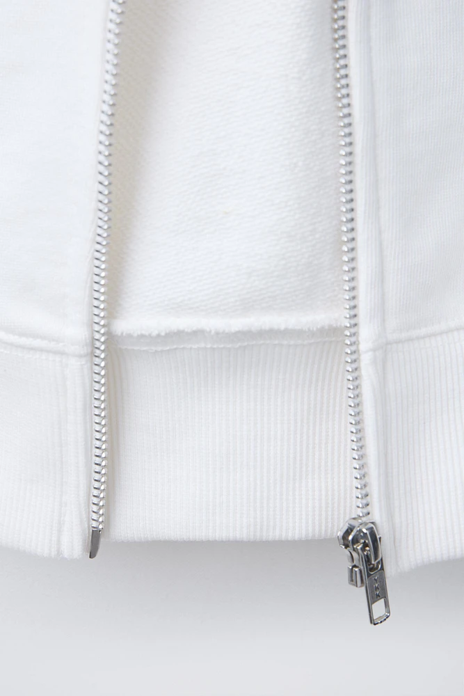 SWEAT COURT À CAPUCHE ZIP VARSITY