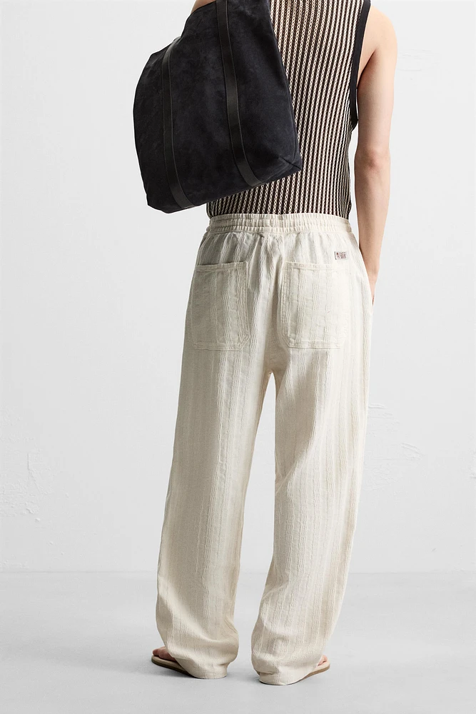 PANTALON JACQUARD RAYÉ