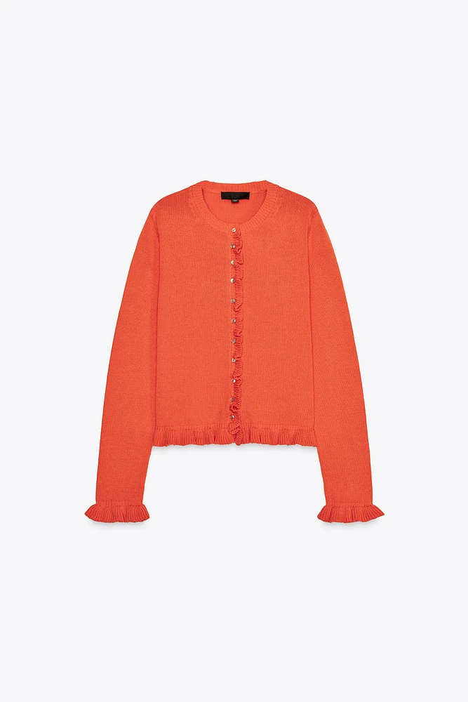GILET EN MAILLE À VOLANTS