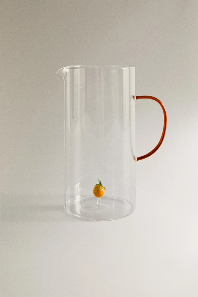 GLASS PITCHER WITH A HANDLE AND ORANGE DETAIL